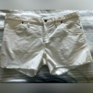 White soft corduroy. Four pockets. Zip fly.